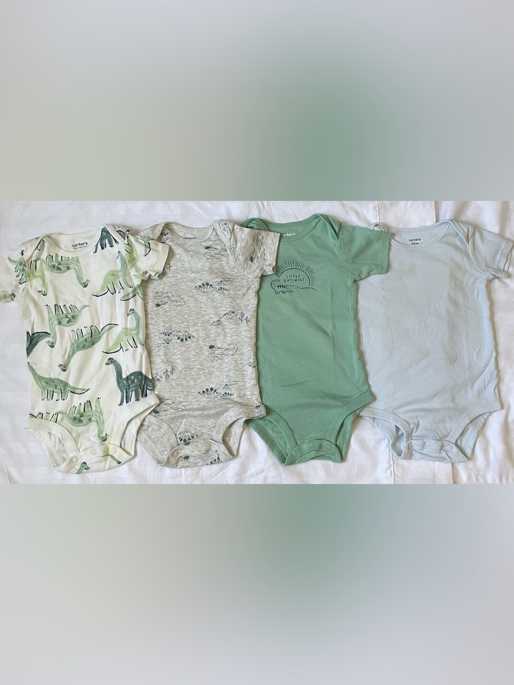 Carter’s 4-Piece Baby Dino Bodysuit Set – 12 Months